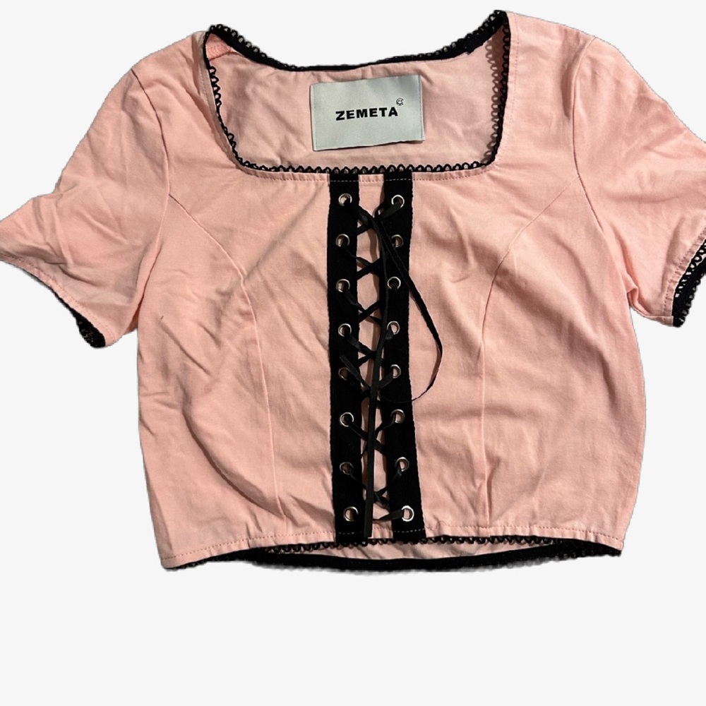 DOLLSKILL  “ZEMETA” lace up front pink top.